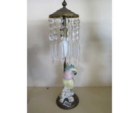 A porcelain cockatoo table lamp with drop lustre top - Height 42cm - needs re wiring, overall no obvious damage