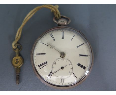 A silver cased open faced pocket watch, white enamel dial with Roman numerals, subsidiary seconds at 6 o'clock fusee detached