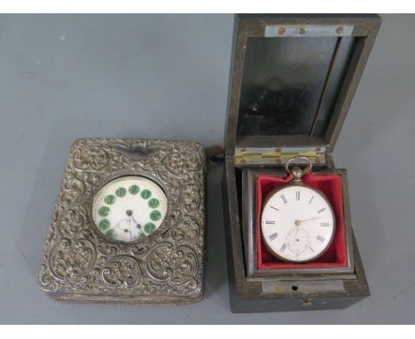 A base metal pocket watch with enamel dial - Width 48mm - working - in a silver fronted case and another pocket watch - not w