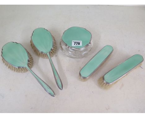 A silver and enamel five piece dressing table setCondition report: Some wear to enamels and small dents, glass good