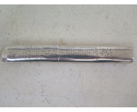 A three section white metal gauge with inch rule to one side and internal flask marked for Gin Condition report: Good conditi