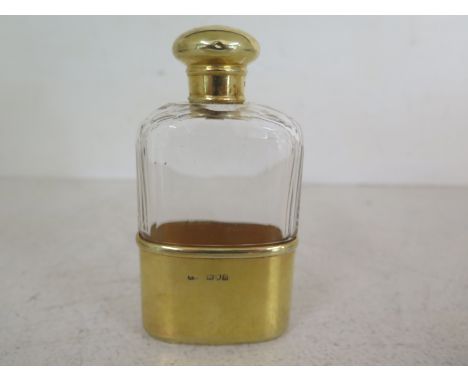 A silver gilt and glass flask, London 1903-04 makers mark indistinct Condition report: In good clean condition 