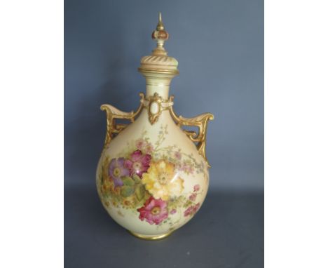 A Worcester blush ground Persian vase, twin handled with lid and decorated with floral design - approx 30cm in height - no da