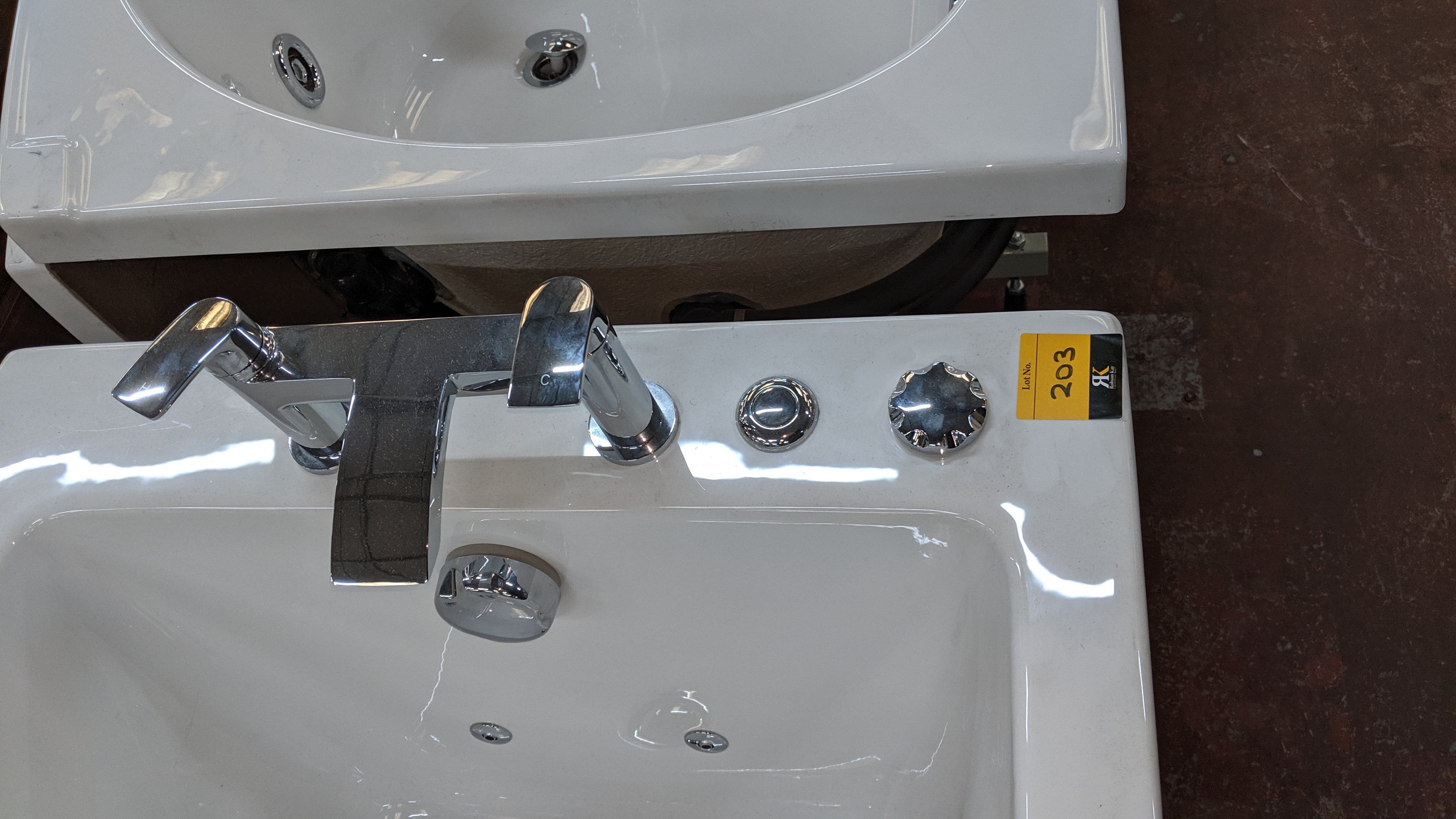 Bath tub with jacuzzi jet inserts plus mixer taps. This is one of a