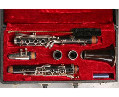 A French 'Selmer Series 10 S' clarinet, the mouthpiece inscribed Ebolin Brilhart 5, the upper and lower joints stamped A8991,