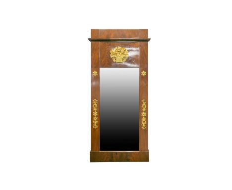 A Danish Neo-Classical mahogany and parcel-gilt wall mirror, late 18th century, with tied ribbon cresting above a gilt profil