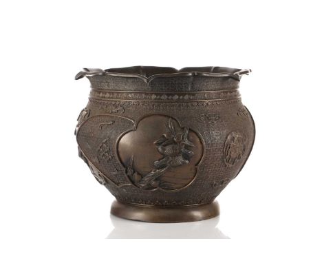 A Japanese patinated bronze heavy baluster jardiniere, Showa period, 20th century, with barbed rim above reserves of waterfow