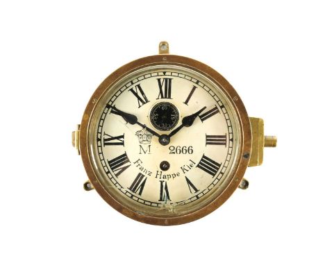 A rare Imperial German Navy bulkhead clock, a type used on U-Boats, the white enamel dial with Roan numerals and a subsidiary