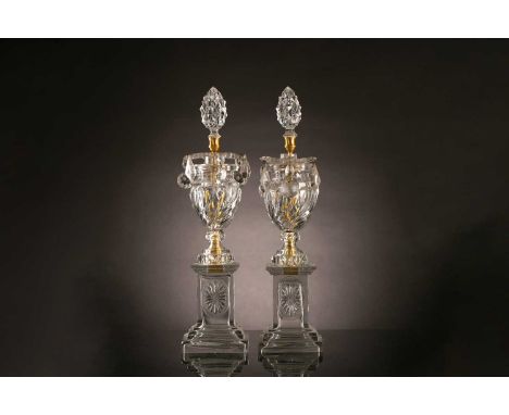 A pair of 19th century Neo-Classical cut glass and ormolu candelabra bases in the manner of Osler of Birmingham. Each of urn 