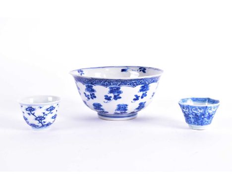 A Chinese blue &amp; white petal moulded bowl, Qing, Kangxi, finely painted throughout with sprigs of flowers on moulded sect