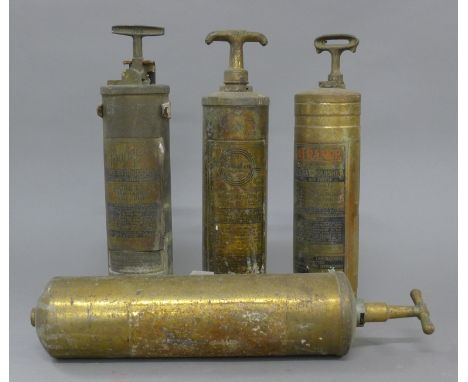Four vintage American fire extinguishers. 