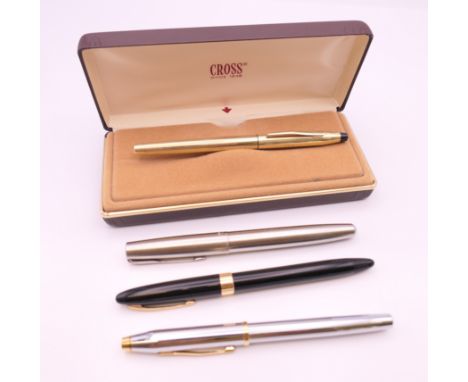 Two Cross fountain pens, one with 14 K gold nib, a Sheaffer 14 K gold nib fountain pen and a Parker fountain pen. 