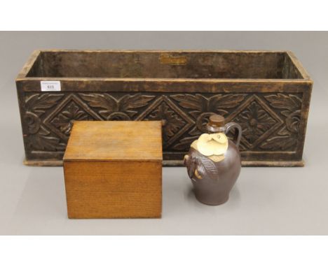 A vintage bottle of French Calvados and two wooden boxes