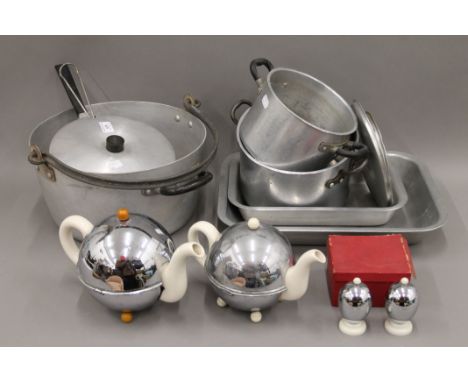 A quantity of vintage AGA cooking pots and two Kosy Kraft teapots.