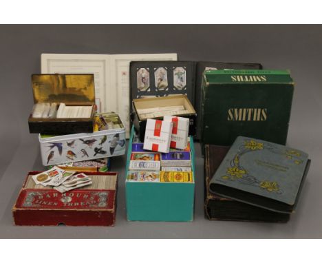 A large collection of vintage cigarette cards.