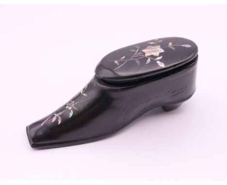 A 19th century mother-of-pearl inlaid lacquered snuff shoe.  8 cm long, 3.5 cm high. 