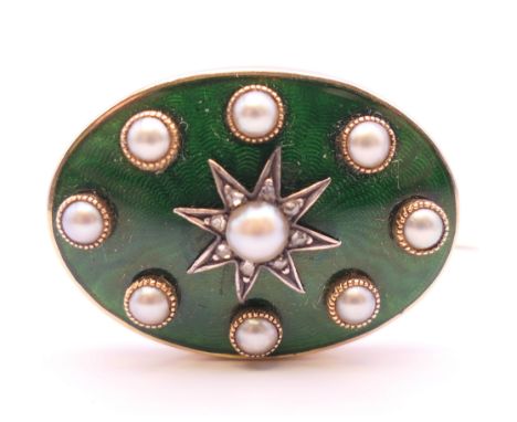 A gold, pearl and green enamel brooch, cased.  2.5 cm x 1.75 cm. 7.9 grammes total weight.