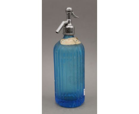 A vintage Greene King blue glass soda syphon. 30 cm high.
