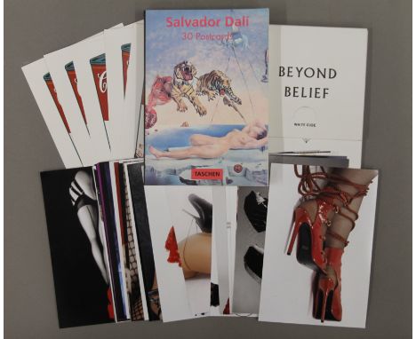 A quantity of various Salvador Dali and Damien Hirst postcards, etc.