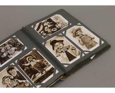 A vintage postcard album.
