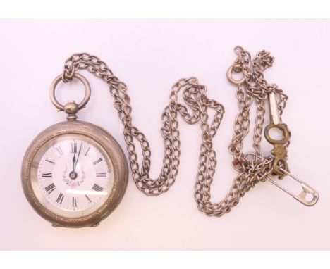 A silver fob watch and a chain.