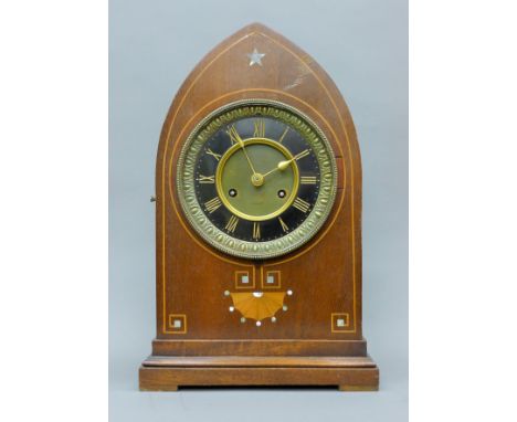 A Victorian inlaid mahogany mantle clock. 35 cm high.
