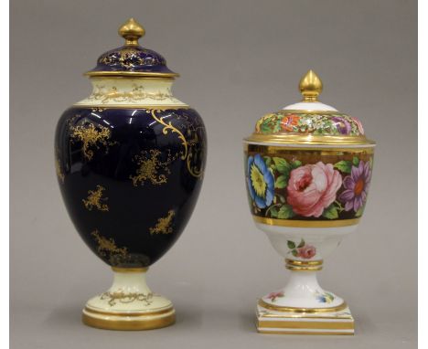 A Coalport porcelain lidded vase decorated with Loch Lomond and a Copelands Spode lidded vase. The former 23.5 cm high.