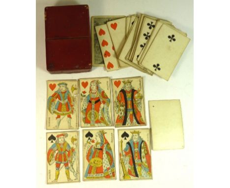 An early 19th Century set of playing cards, Paris pattern with named single figure court cards, plain backs and in red box to