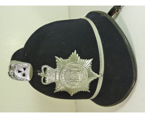 An unused Suffolk Constabulary helmet size 67/8 with white metal badge and leather chin strap ++unused but very small area of