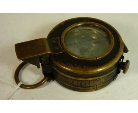 A Mk III marching compass in black lacquered brass case dated 1937, F Barker & Son