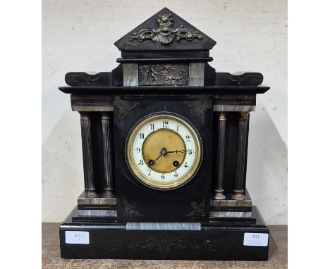 A 19th Century French Belge noir mantel clock 