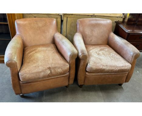 A pair of Art Deco stye tan leather armchairs 