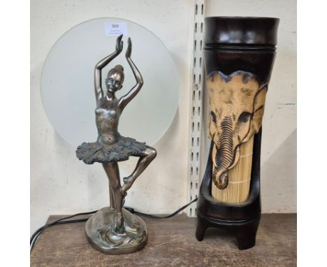 An Art Deco style resin figural lamp of a ballerina and a carved carved wooden lamp, from Koh Samui