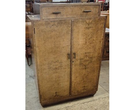 An Art Deco burr walnut tallboy 