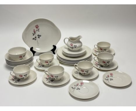 A Royal Doulton Pillar Rose pattern part tea service comprising, a serving dish, six plates (w-24cm), six teacups, a sugar bo