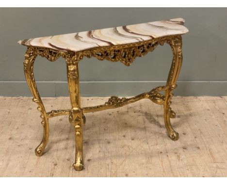 A 20th century carved giltwood and faux marble-topped console table, shaped top above rococo style carved carbriole supports: