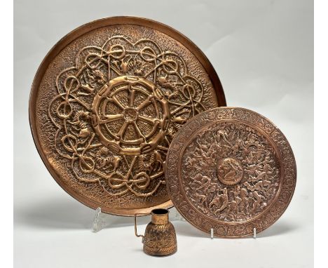 A 19thc copper plaque depciting Batlle of The Amazons in relief raised on three bun feet (w-23cm), a Celtic style embossed co