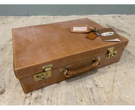 A Papworth of Cambridge tan leather handmade attache case with brass locks and clasps, complete with original keys and signed