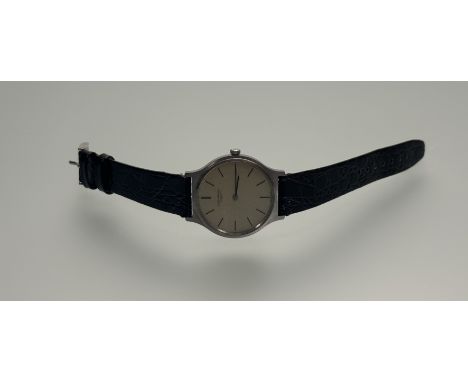 A Longines stainless steel wristwatch with baton hour makers and silvered dial: d. x 3cm on black strap working 