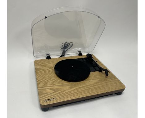 An ION turntable record player in classical wood grain finish with cables (l. 41cm) 