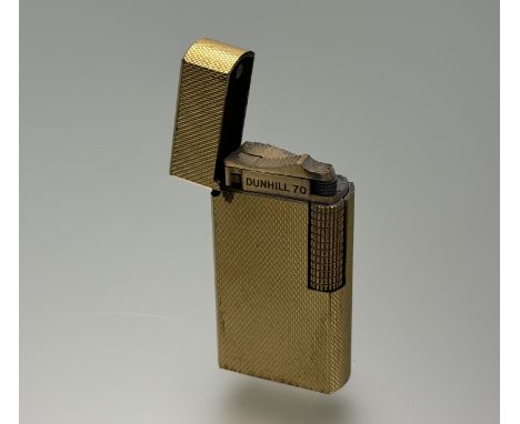 An Alfred Dunhill 70 gilt metal lighter in original fitted box with instructions: h. x 6m 
