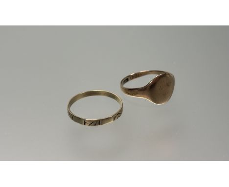 A 9ct gold signet ring unengraved M 1.43g and a yellow metal wedding band K 0.85g  (2)