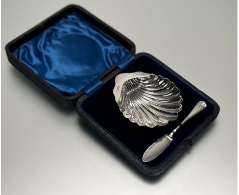 An Edwardian Birmingham silver shell butter dish: h. x 2.5cm l. x 10cm Birmingham 1900 and assosiate Victorian silver engrave