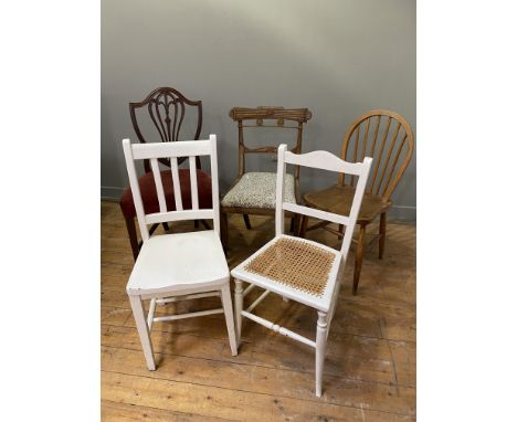 A collection of five assorted chairs, to include a regency chair with carved top rail, Morris upholstery and sabre supports, 