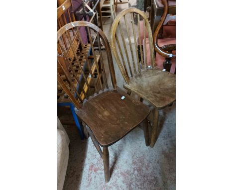 Three similar old hoop stick back kitchen chairs, all with moulded seats