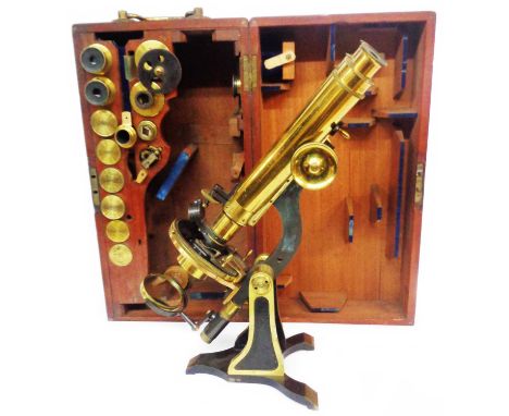 A Victorian brass binocular microscope by Henry Crouch of 51 London Wall, London (No. 629) with part anodised finish and cont