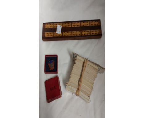 A vintage National Union of Railwaymen lapel badge - sold with a wooden cribbage board, and a small quantity of Brooke Bond a