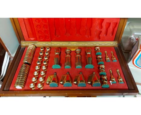 A vintage Walter Gold &amp; Sons Ltd of Tamworth heavy brass chess and drafts compendium in fitted wooden chess board pattern