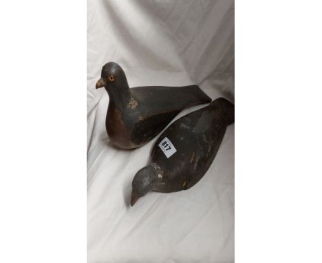An old carved wood pigeon decoy with painted finish and inset glass eyes (stand missing) - sold with a vintage cast aluminium