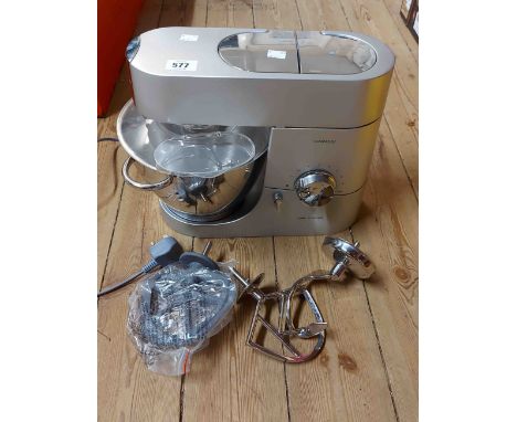 A modern Kenwood Titanium food mixer with accessories